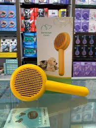 Cepillo Calabaza para Perros y Gatos – Autolimpiante y Masajeador